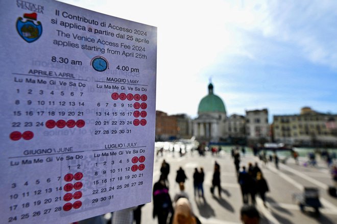 Novi koledar v Benetkah FOTO: Gabriel Bouys/AFP