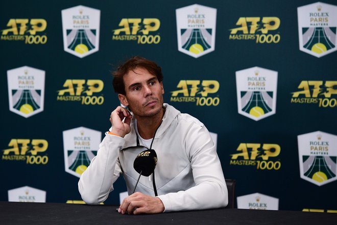 Rafaela Nadala na vrhu lestvice ATP in drugouvrščenega Novaka Đokovića loči 640 točk. Poškodovani Španec bo v četrtek spet treniral. FOTO: Martin Bureau/AFP