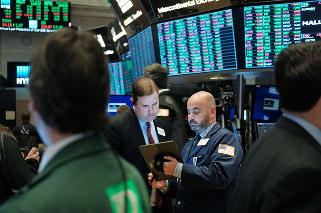 Analitiki pričakujejo, da bo proti koncu leta razpoloženje na borznih trgih pozitivno. FOTO: AFP