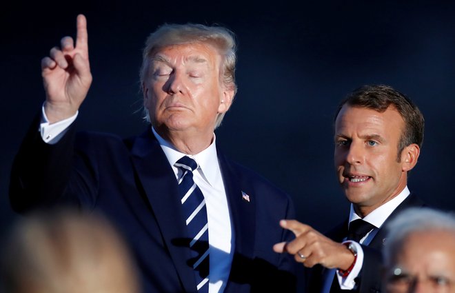 Donald Trump in Emmanuel Macron med letošnjim zasedanjem skupine G7 v Biarritzu. Foto Reuters