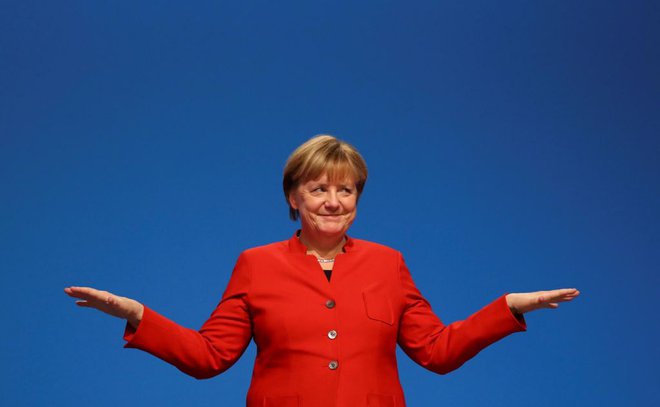 Angela Merkel si lahko oddahne, ni pa čas za odpiranje šampanjcev.&nbsp; FOTO: Reuters<br />
&nbsp;