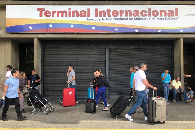 Po podatkih OZN je Venezuelo v zadnjih letih zapustilo skoraj 4 milijone ljudi. FOTO: Marco Bello/Reuters