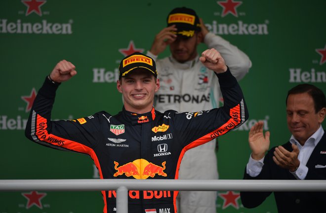 Max Verstappen se je takole veselil zmage v Sao Paulu. FOTO: AFP