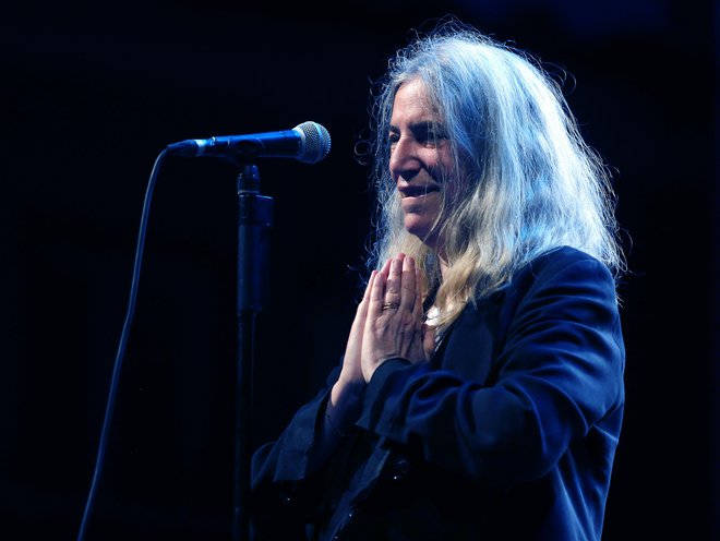 Legendarna Patti Smith, kot so jo ujeli Delovi fotografi med koncertom v Križankah v Ljubljani. FOTO: Aleš Černivec/Delo