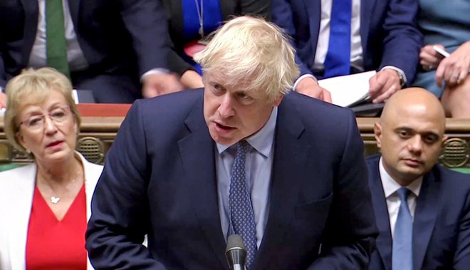 &raquo;Želijo spremeniti vlado, naj imajo volitve,&laquo; je v parlamentu izjavil Boris Johnson. FOTO: Reuters