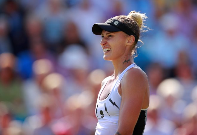 Polona Hercog je po dveh zmagah v Pekingu nasmejana, Foto Reuters