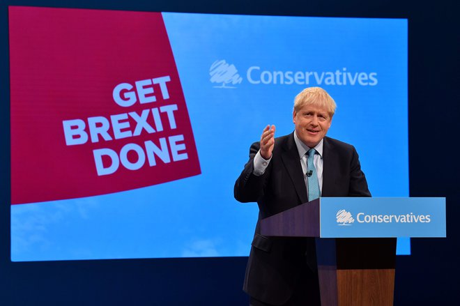 Britanski premier Boris Johnson med nastopom na kongresu konservativne stranke v Manchestru. Foto&nbsp;Afp
