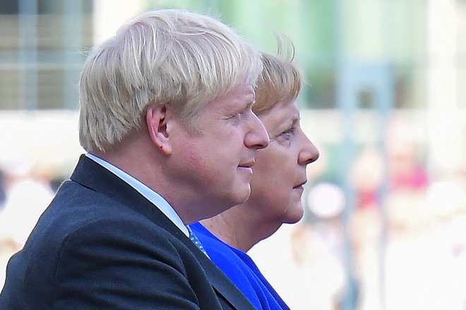 Boris Johnson in Angela Merkel med njunim srečanjem v Berlinu avgusta letos. Foto:Afp