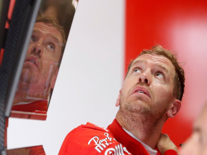Sebastian Vettel je na včerajšnjih prostih treningih v Suzuki zasedel tretje in peto mesto. FOTO: Reuters