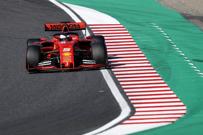 Nemški dirkač Sebastian Vettel si je pridirkal prvo štartno mesto. FOTO: Issei Kato Reuters