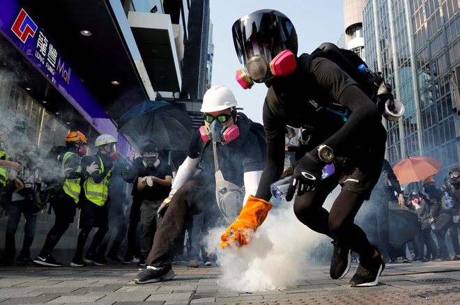 Tisto, kar bolj kot vse povezuje Katalonce in Hongkonžane, je zahteva po ponovni opredelitvi njihove identitete. FOTO:Tyrone Siu/Reuters