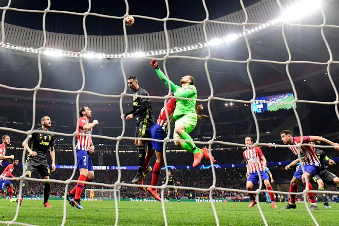 Jan Oblak in Atletico Madrid sta se letos izognila Cristianu Ronaldu in Juventusu, a bo evropski prvak Liverpool še močnejši tekmec v osmini finala kot je bil italijanski velikan. Foto AFP