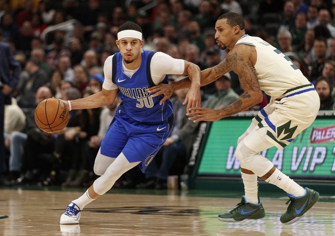 Seth Curry (z žogo) je bil med najzaslužnejšimi za zmago Dallasa. FOTO: Usa Today Sports