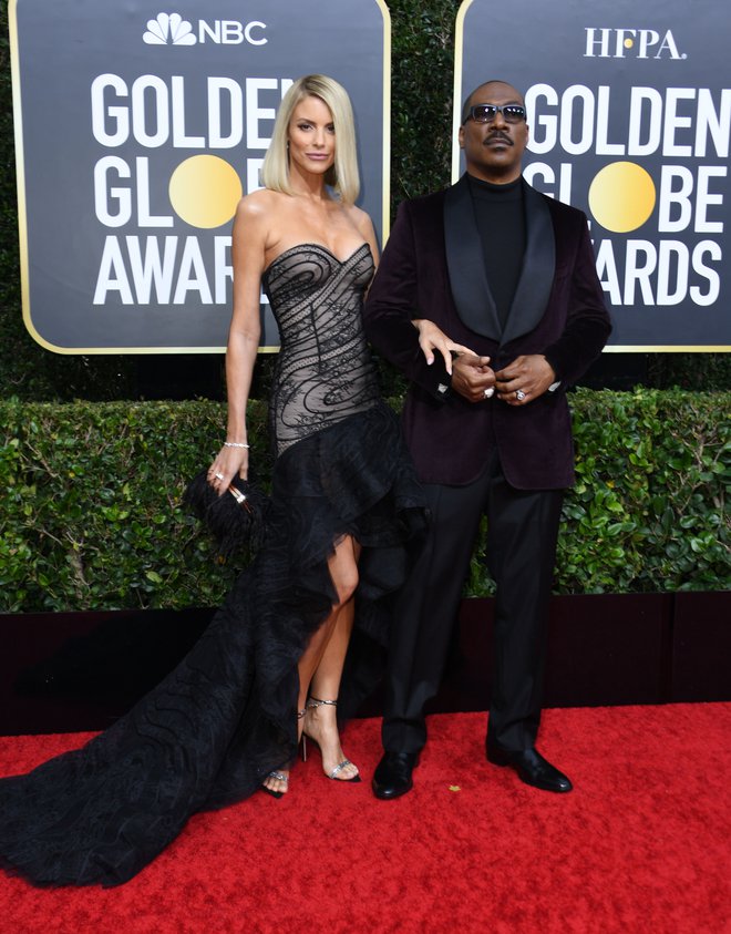 Igralec <strong>Eddie Murphy</strong> s soprogo in igralko <strong>Paige Butcher</strong>. FOTO: Valerie Macon/AFP