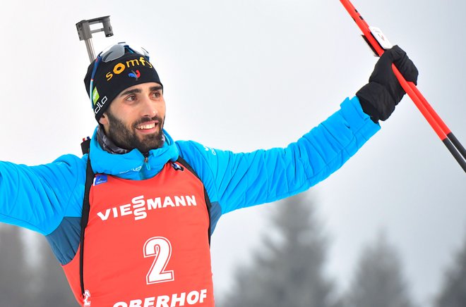 Martin Fourcade je z zmago prevzel tudi vodstvo v skupnem seštevku svetovnega pokala. FOTO: Tobias Schwarz/AFP