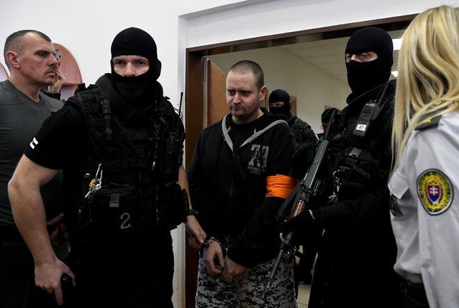 Štirim obtoženim grozi 25 let zapora, če jih bodo spoznali za krive. FOTO: Radovan Stoklasa/Reuters