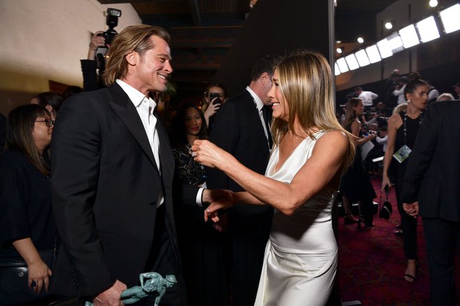 Brad in Jennifer sta ostala prijatelja, njuni stiki pa so menda po Pittovi ločitvi od Angeline Jolie še tesnejši. FOTO: Emma Mcintyre/AFP