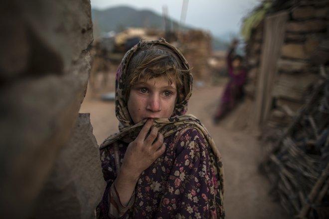 Devetdeset odstotkov otrok v revnih državah pri desetih letih ne zna brati ali ne zmore razumeti enostavnega besedila, opozarjajo strokovnjaki. Foto Reuters