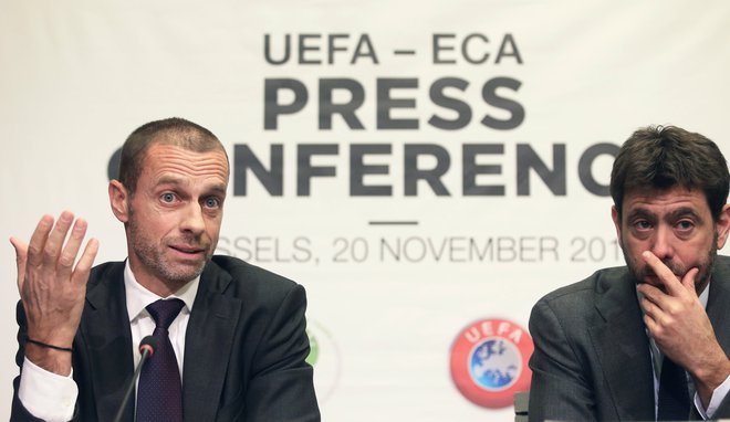 Predsednik Uefe Aleksander Čeferin in prvi mož klubskega združenja Eca, tudi predsednik Juventusa, Andrea Agnelli v Bruslju. FOTO: Reuters