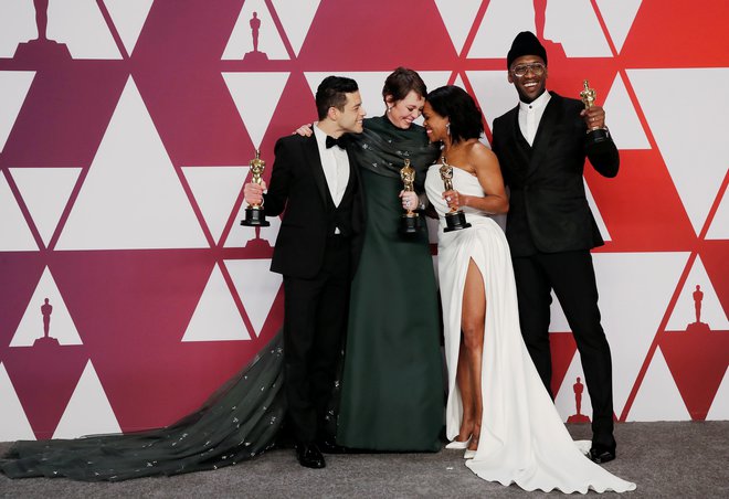 Rami Malek, Olivia Colman, Regina King in Mahershala Ali po podelitvi. FOTO: Mike Segar/Reuters