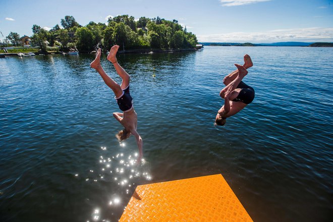 Skoraj zanesljivo bo letošnje poletje med petimi najtoplejšimi v zadnjih 60 letih, najbolj verjetno drugo najtoplejše.&nbsp;FOTO: Trond Reidar Teigen/AFP