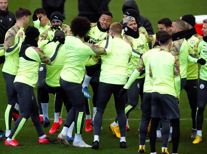 Nogometaši Manchester Cityja so bili na zadnjem treningu pred prvo tekmo proti madridskemu Realu bolje razpoloženi kot vodstvo kluba. FOTO: Reuters