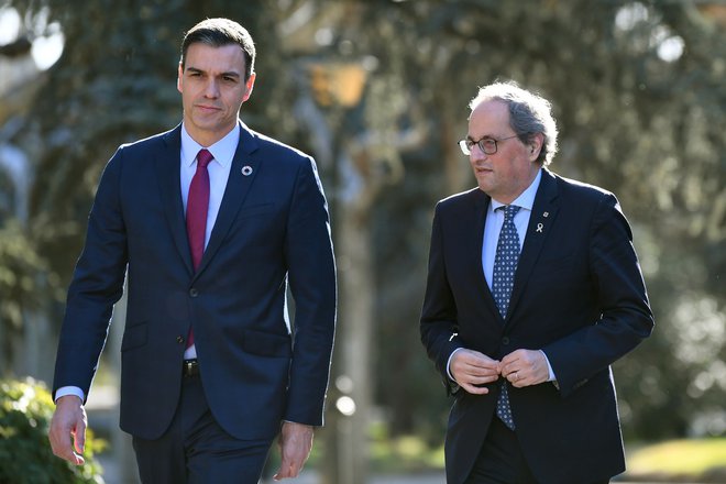 Včeraj sta se v prestolnici sestala katalonski predsednik Quim Torra in španski premier Pedro Sánchez. Foto: AFP