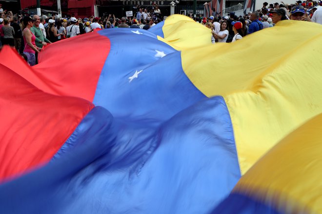 Sedemnajst oseb iz Venezuele je aprila zaprosilo Slovenijo za repatriacijo. Razmere v državi so vsak dan slabše, pišejo v prošnji. FOTO: Ivan Alvarado/Reuters