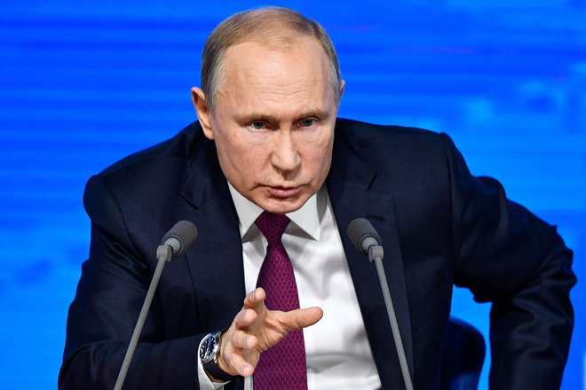 Ruski predsednik Vladimir Putin želi vpis vere Rusov v Boga in heteroseksulnega zakona v ustavo. FOTO: Alexander Nemenov/AFP