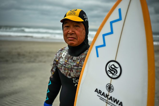 Cunami je Kodžiju Suzukiju odnesel vse, razen življenja in ljubezni do deskanja. FOTO: AFP