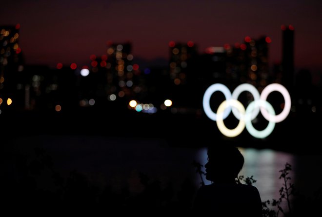 Nad olimpijske igre v Tokiu se spušča mrak. FOTO: Reuters