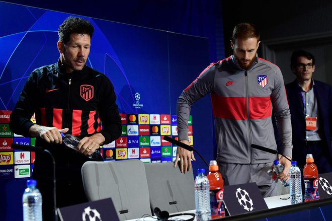 Atleticov trener Diego Simeone in vratar Jan Oblak. FOTO: AFP