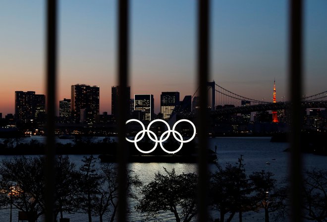 Nov termin olimpijskih iger še ni potrjen, bodo pa tudi prestavljene OI najverjetneje v poletnem terminu, tako kot so bile letošnje odpovedane. FOTO: Reuters