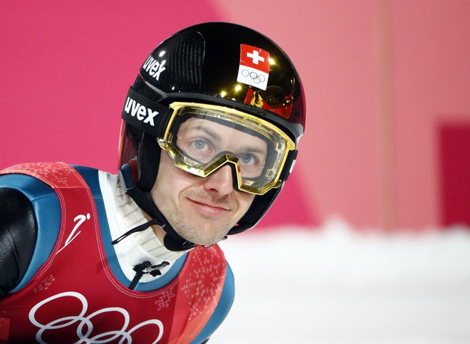 Simon Ammann je s svojo odločitvijo presenetil in obenem razveselil številne navijače. FOTO: Reuters