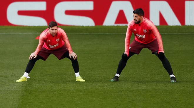 Lionel Messi in Luis Suarez bosta drevi glavna aduta Barcelone v Manchestru.&nbsp;FOTO: Reuters