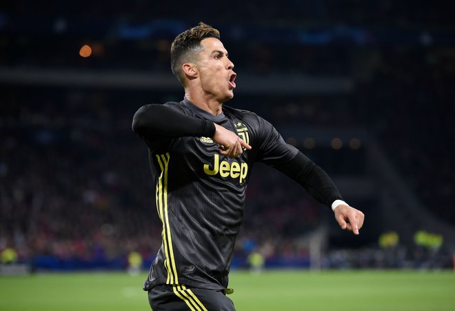 Cristiano Ronaldo je zabil svoj 125. gol v ligi prvakov in beži najbližjemu zasledovalcu Lionelu Messiju za 17 golov. FOTO: AFP