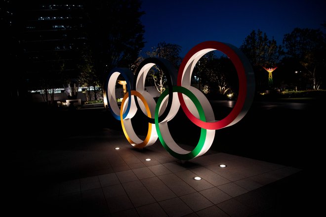 Epidemija koronavirusa je tudi japonske prireditelje olimpijskih iger tako prestrašila, da si ne upajo zagotovoti, da bodo naslednje leto izpeljali največje športno tekmovanje. FOTO: AFP