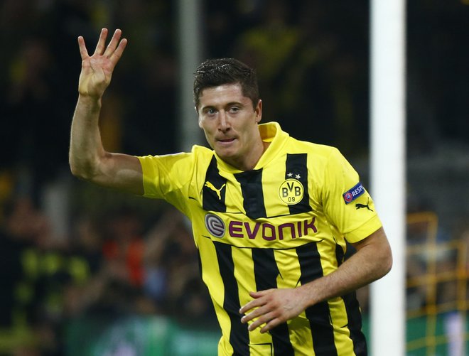 Robert Lewandowski se je veselil štirih golov proti Realu. FOTO: Reuters