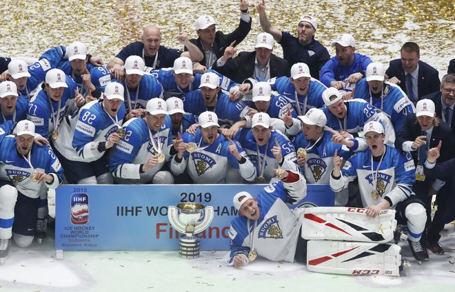 Na lanskem SP so naslov prvaka slavili finski hokejisti. FOTO: Reuters