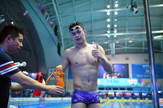 Kitajski plavalni zvezdnik Sun Yang je osvojil kar tri olimpijske zlate kolajne in je bil tudi enajstkratni svetovni prvak. Zaradi kršenja dopinških pravil je letos prejel osemletno prepoved tekmovanja. FOTO: AFP