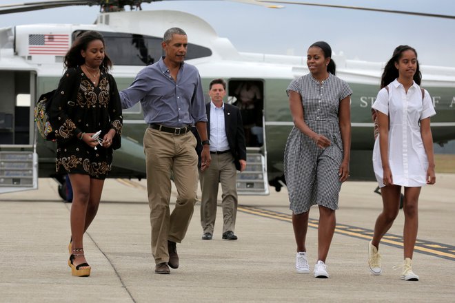 Ameriška »prva družina«: Barack in Michelle Obama s hčerama Malio (na desni) in Sasho Foto Reuters