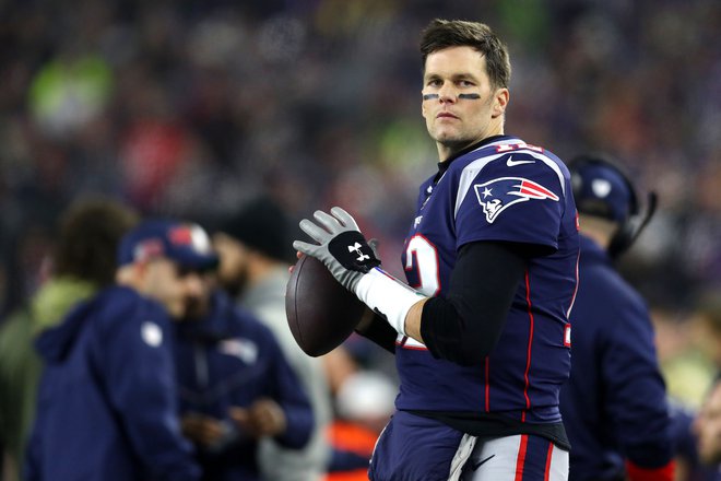 Tom Brady se bo po dolgih letih igranja za New England preizkusil še v dresu Tampe. FOTO: AFP