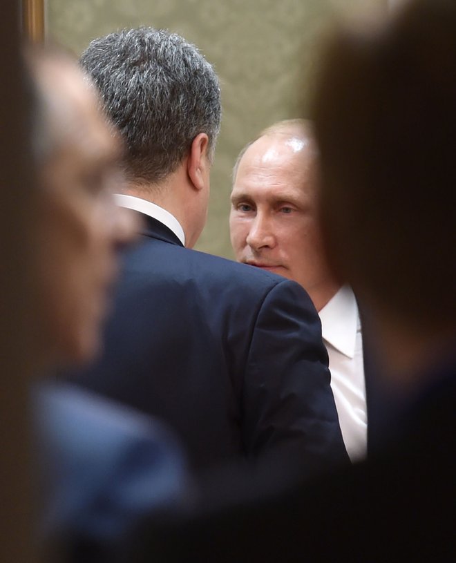 Ruski predsednik Vladimir Putin na fotografiji iz leta 2015 v Minsku.&nbsp;Foto Mykola Lazarenko Afp - International News Agency