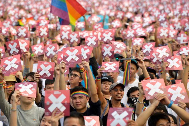 Skupnost LGBT poziva državljane, naj glasujejo za enakopravnost in zavračajo argumente sovražnih skupin. FOTO: AFP