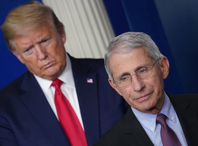 Predsednik Trump in njegov zdravstveni strokovnjak dr. Anthony Fauci.&nbsp;FOTO: Mandel Ngan/AFP