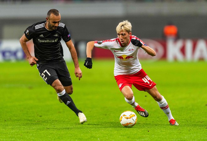 Kevin Kampl ostaja med najvidnejšimi aduti Leipziga v nemškem prvenstvu. FOTO: AFP