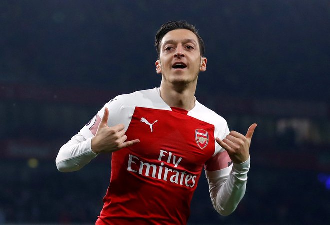Mesut Özil je v tej angleški sezoni streljal le štirikrat, a vselej zabil gol. FOTO: Reuters