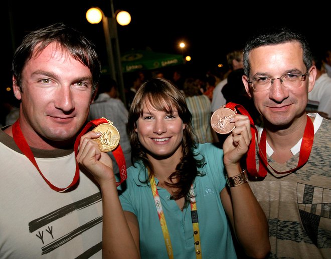 Peking 2008: zlati Primož Kozmus, srebrna Sara Isaković in bronasti Rajmond Debevc. FOTO: Matej Družnik/Delo