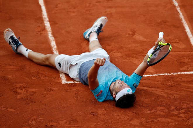Marco Cecchinato do letošnjega Roland Garrosa ni dobil nobenega dvoboja na turnirjih za veliki slam, zdaj je pariški četrtfinalist. FOTO: Reuters