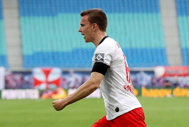 Lukas Klostermann se je takole veselil izenačujočega gola za Leipzig. FOTO: Reuters